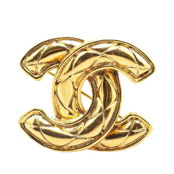 CHANEL Gold Logo Brooch